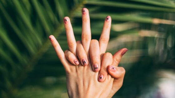 selective focus photography of person's hands