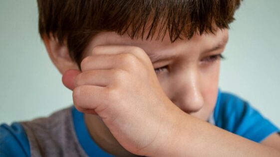 Boy Wiping his Tears