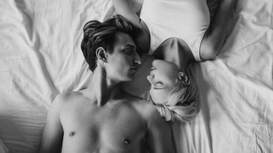 Young Couple Lying in Bed