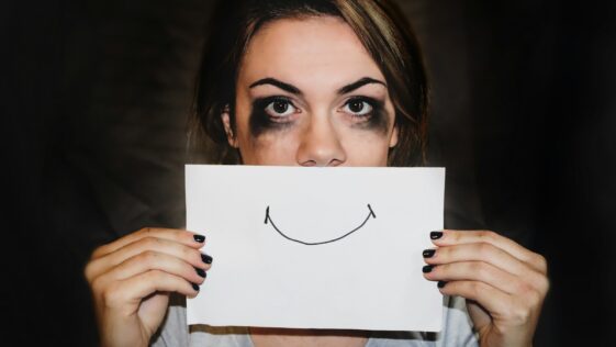 person holding white printer paper