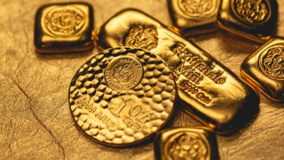a group of gold bars sitting on top of a table