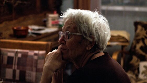 woman in black shirt wearing eyeglasses