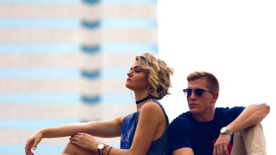man and woman sitting posing for photo
