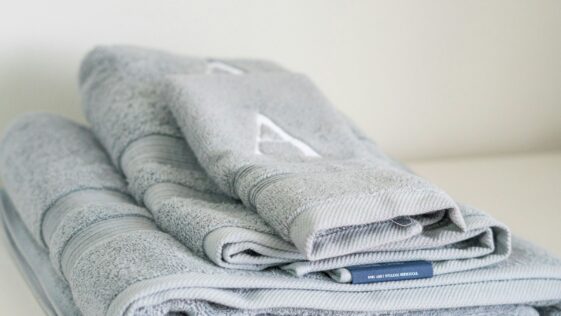 A stack of folded towels sitting on top of a table
