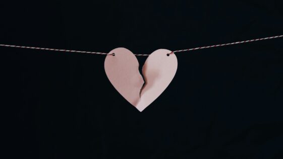 broken heart hanging on wire