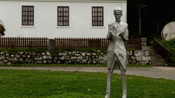 a statue of a person in a yard