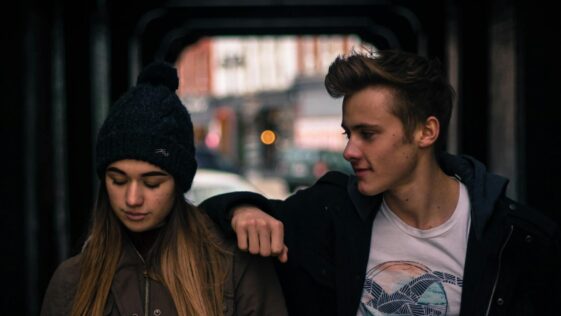 Teenagers sharing a moment outdoors in Stratford, Canada.