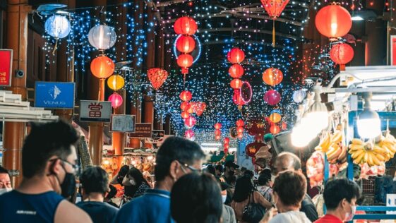 people walking on street during nighttime
