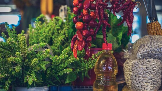 a variety of vegetables are on display at a market