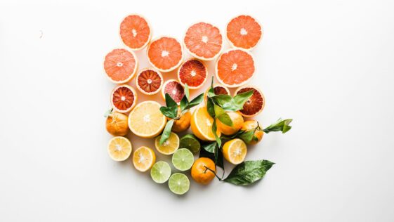 sliced fruit on white surface