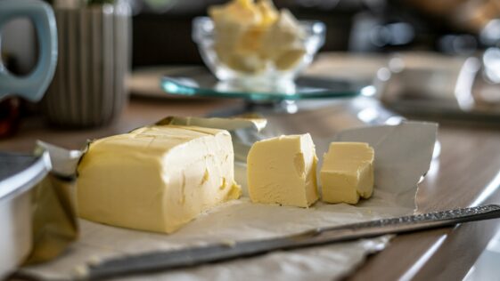 sliced cheese on clear glass plate