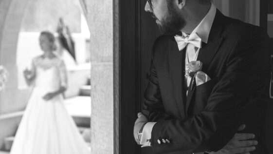 man looking at his bride