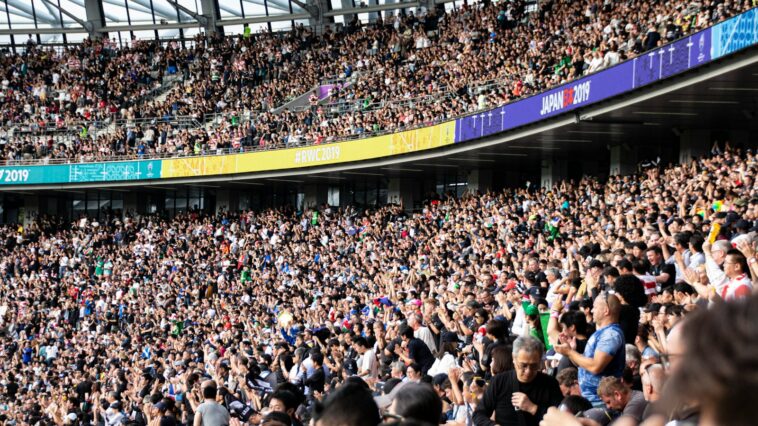 people at the bleachers of the stadium