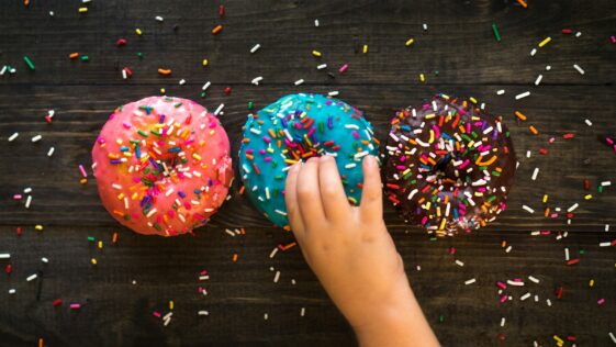 three sprinkled doughnuts