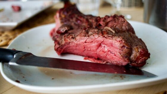raw meat on white plate