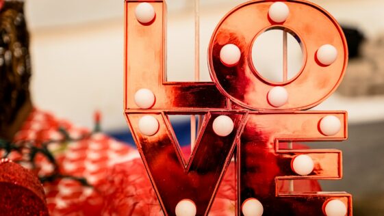 brown and white love lighted signage