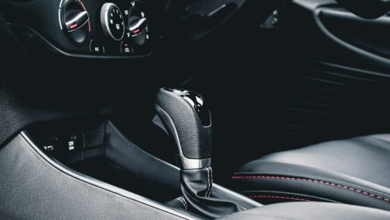 black and gray car gear shift lever