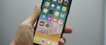 person holding space gray iPhone 7